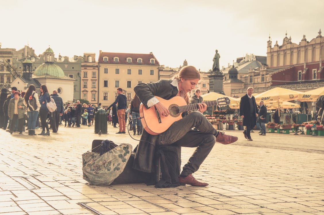 Free Man Playing Acoustic Guitar Stock Photo