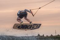 A Tattooed Man Wakeboarding