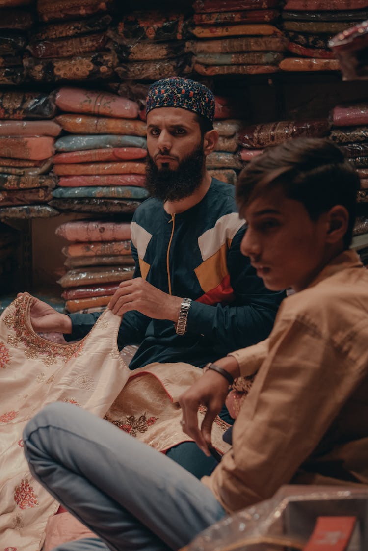 Indian Friends With Ornamental Clothes In Bazaar