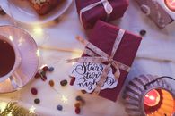 A Gift beside a Candle