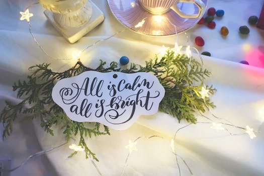 Illuminated Christmas decorations featuring string lights, pine leaves, and a festive quote.