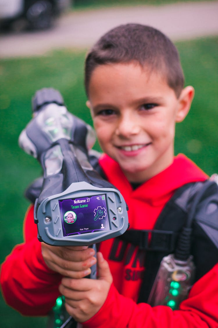 Boy With Plastic Gun With LCD Screen