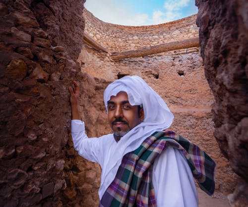 A Man in White Hijab 