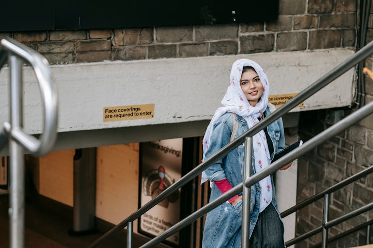 Satisfied Lady Rising From Underpass In City