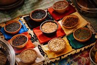 Assorted Grains on Red Ceramic Bowls