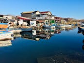 Boats Docked on River Side