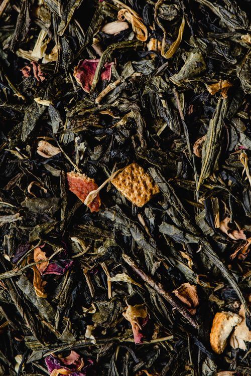 Free Detailed close-up of a diverse organic loose leaf tea blend with spices and dried fruit. Stock Photo