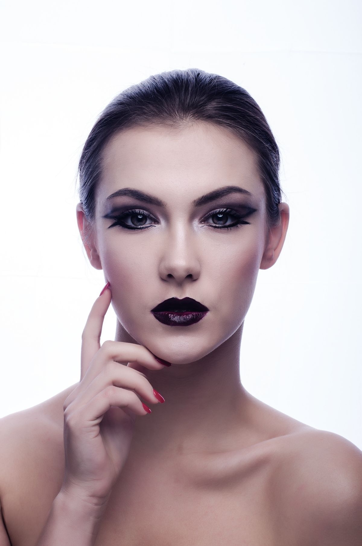 Balancing dusty rose blush with contour makeup