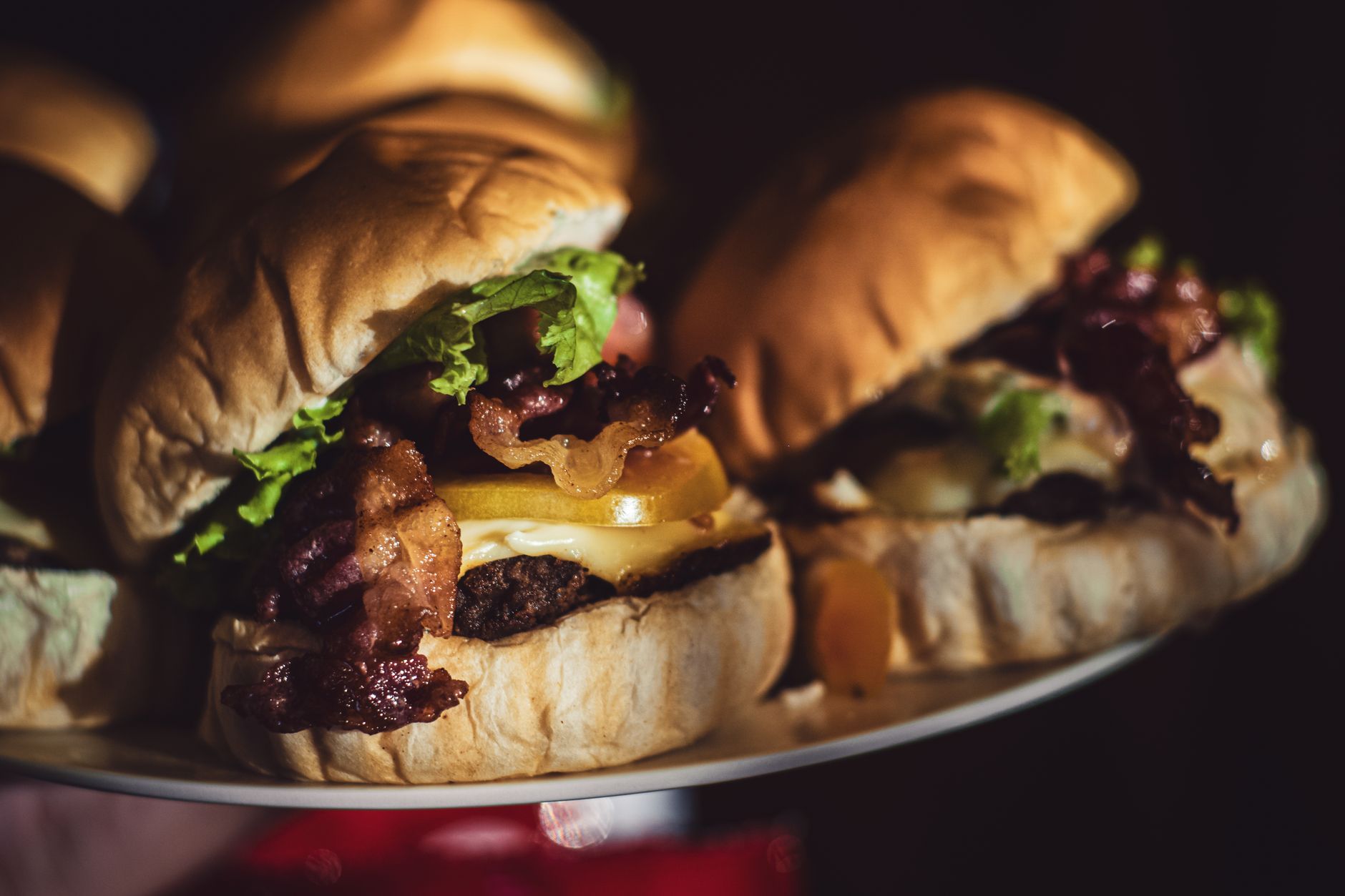 Assortment of fast food burgers on a tray ready to eat