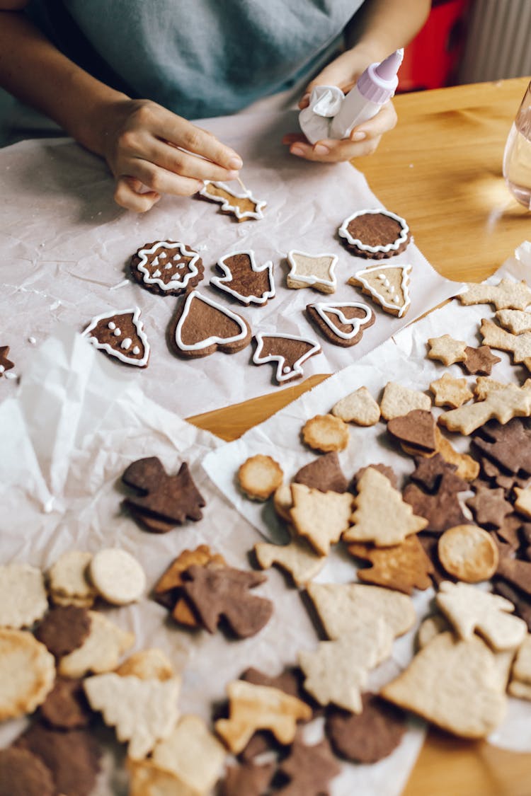 Brown And White Cookies On White Wax Paper