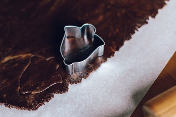 Stainless Bell Shape Cookie Cutter On Chocolate Dough