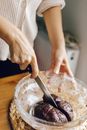 Person Holding Stainless Steel Spoon