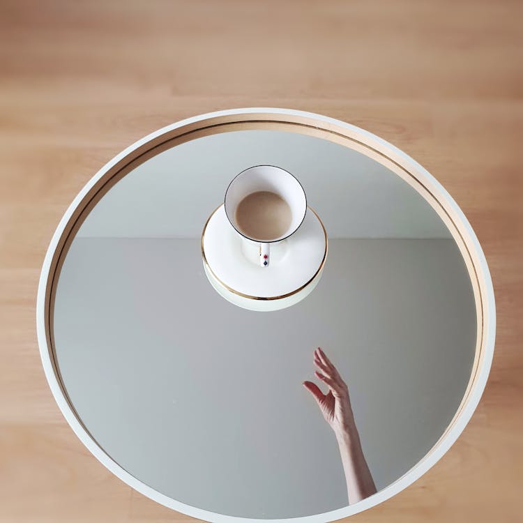 Hand Reaching For Coffe On Tray