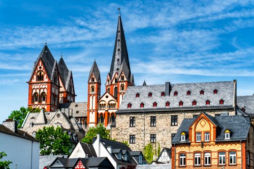 Free Stunning view of Limburg Cathedral, a historic landmark in Germany, against a blue sky. Stock Photo