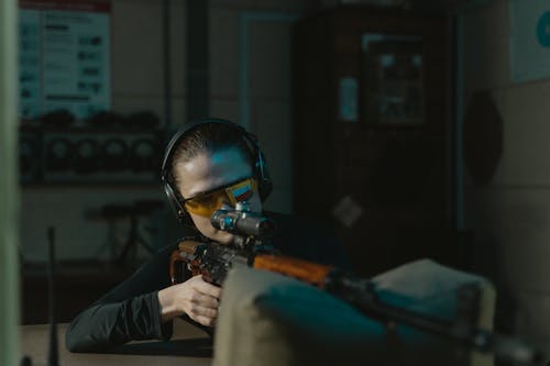 A Person using a Rifle