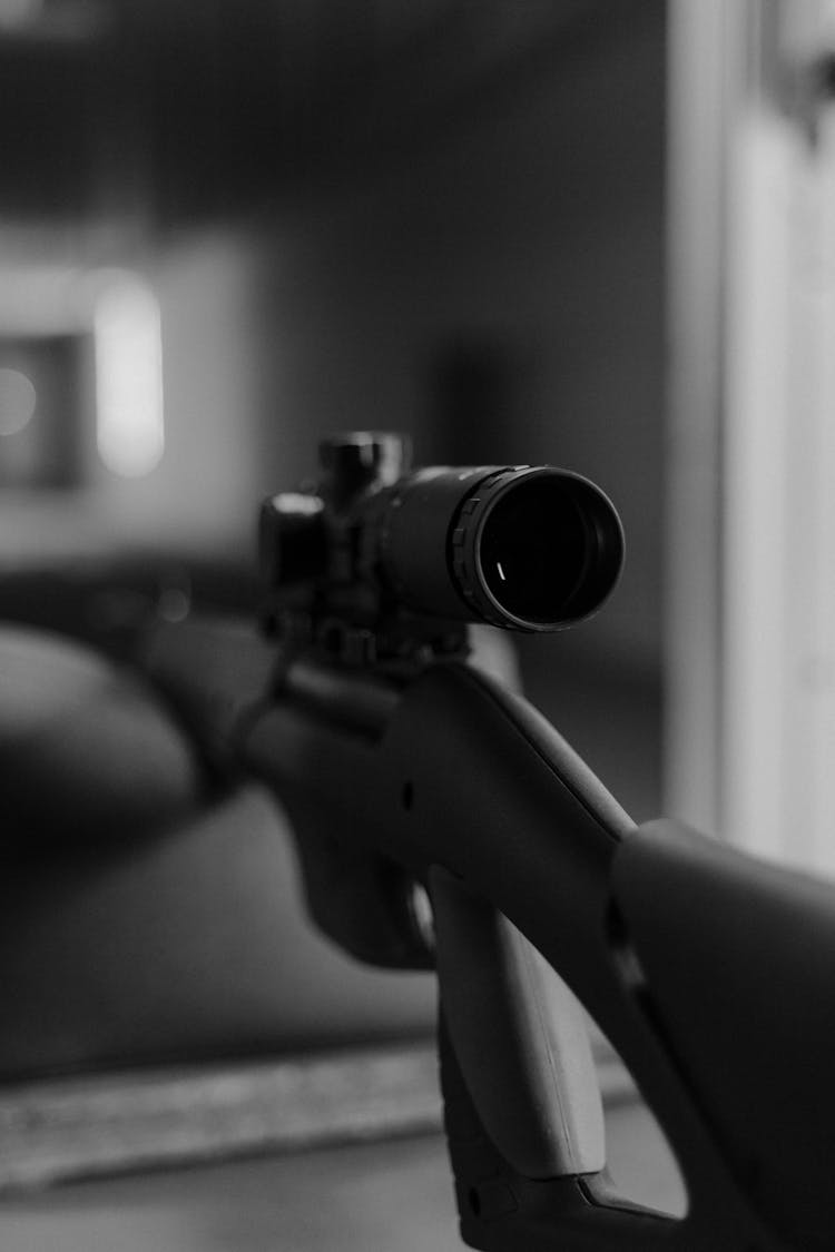 Grayscale Photo Of A Firearm 