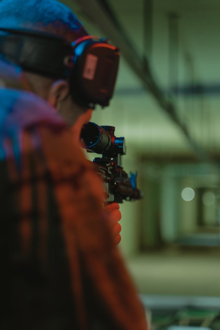 Person Holding Black And Gray Camera