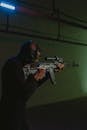 A Man Firing a Rifle