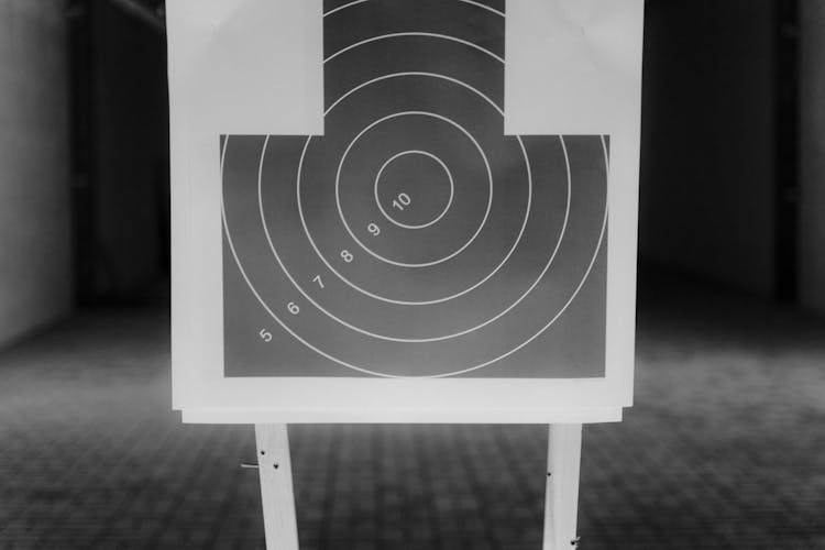 Shooting Target Paper In Grayscale Photography