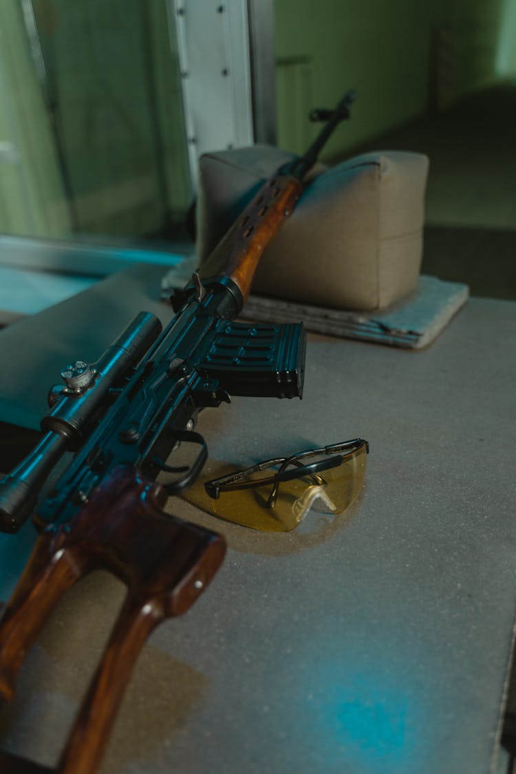 Black Sniper Rifle On Gray Table