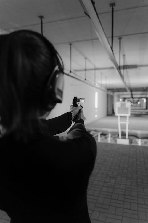 Free A Woman at a Shooting Range  Stock Photo