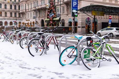 Bicycles Parked on Snow Covered Ground