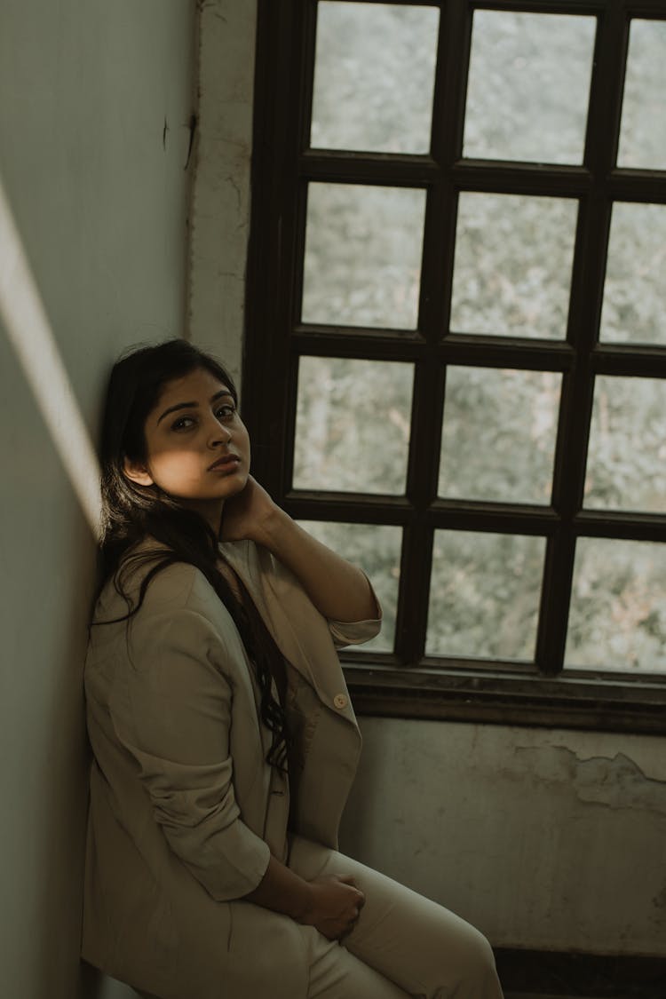 Calm Indian Woman In Elegant Suit