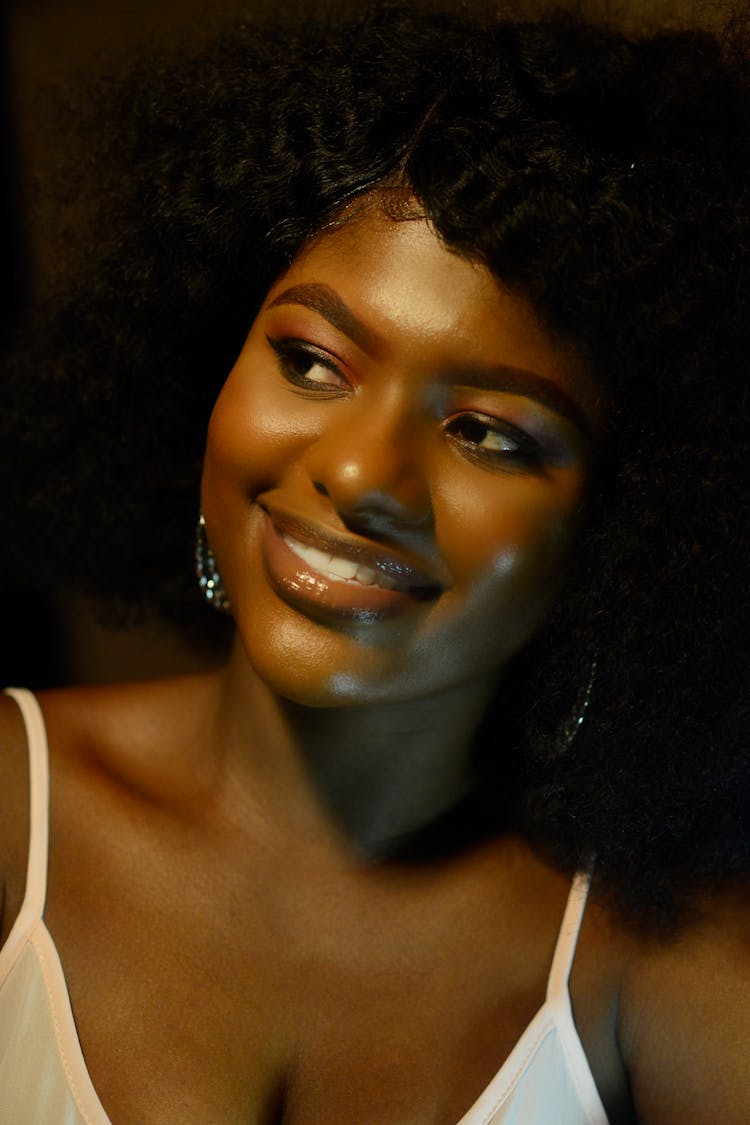 Portrait Of A Smiling Woman Looking To The Side 