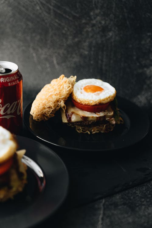 Free Ramen Burger with Tomato Slices and Egg  Stock Photo
