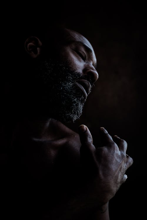 Close Up Photo of a Bearded Man