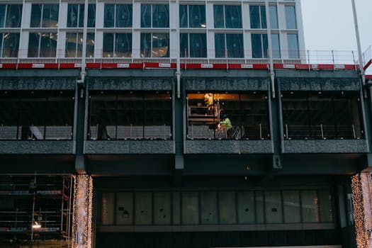 A contemporary building under construction in Brussels, Belgium, highlighting urban architecture and development.
