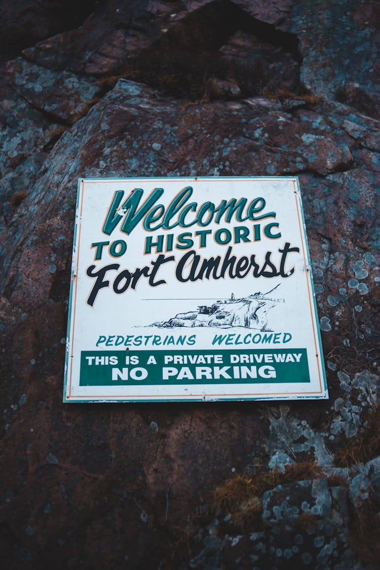 Retro Sign With Inscriptions On Rough Surface