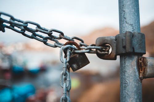 Metal chain with lock on street