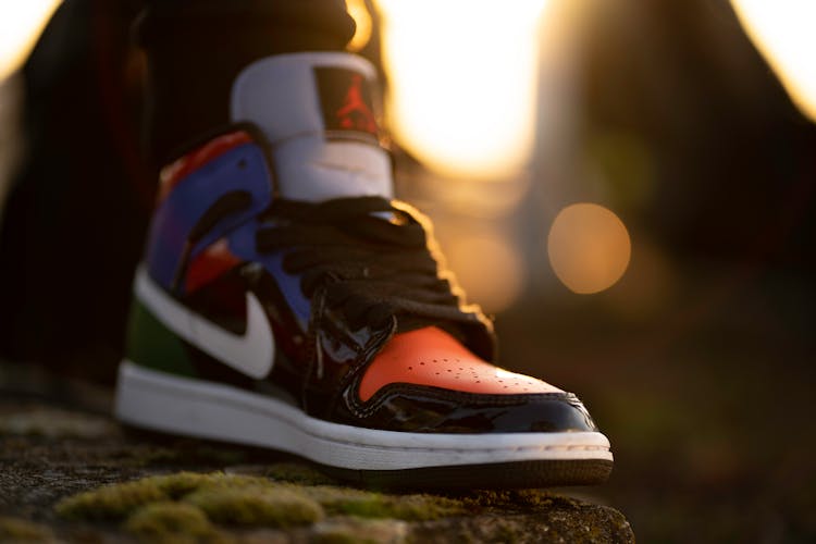 Selective Focus Photo Of A Shoe With Black Laces