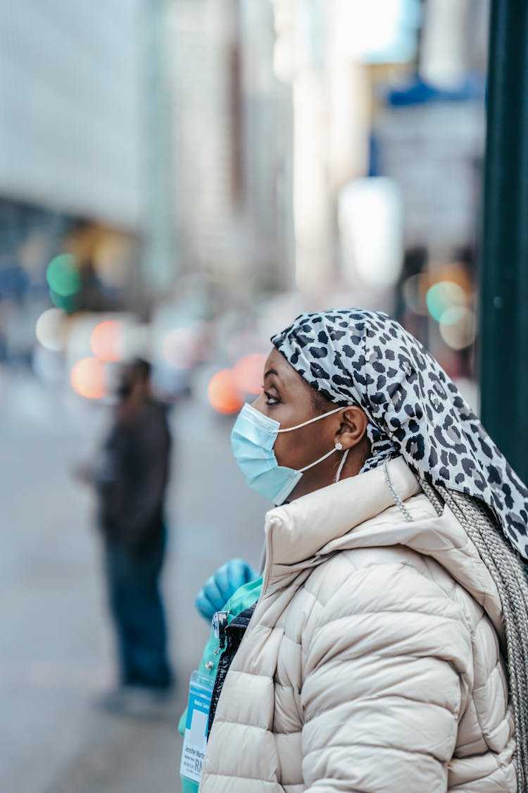 Ethnic Doctor In Mask On Street In Town