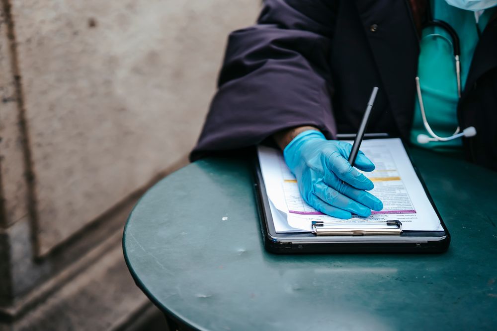 Healthcare professional at work, by Laura James on Pexels