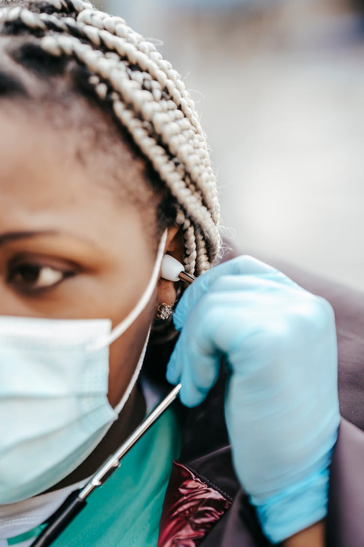 Black Lady Nurse In Mask And Gloves