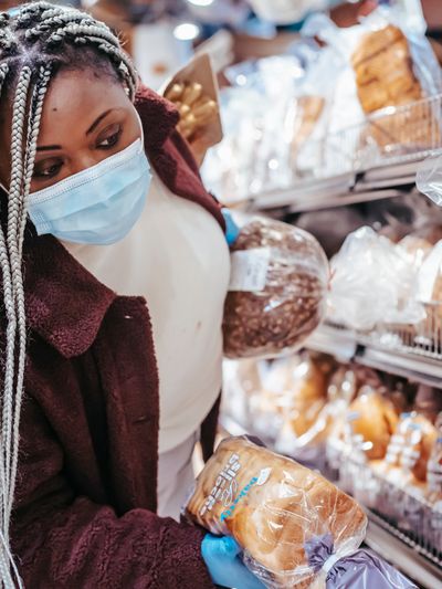 Warm bakery interior with bread shelves