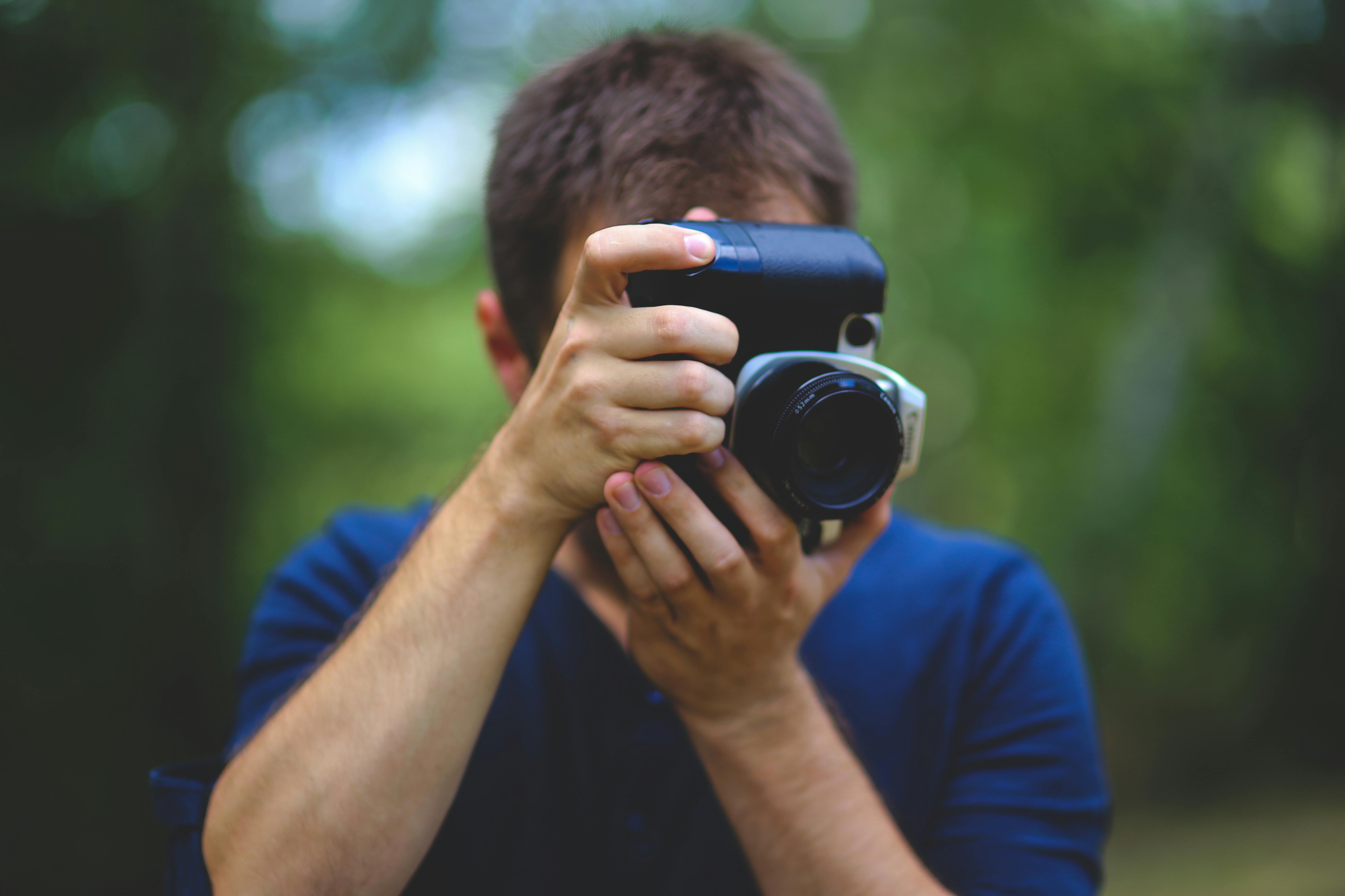 Person Holding Phone Taking Picture of Served Food · Free Stock Photo