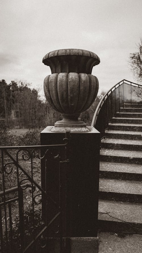 Classic decorative vase near stairway