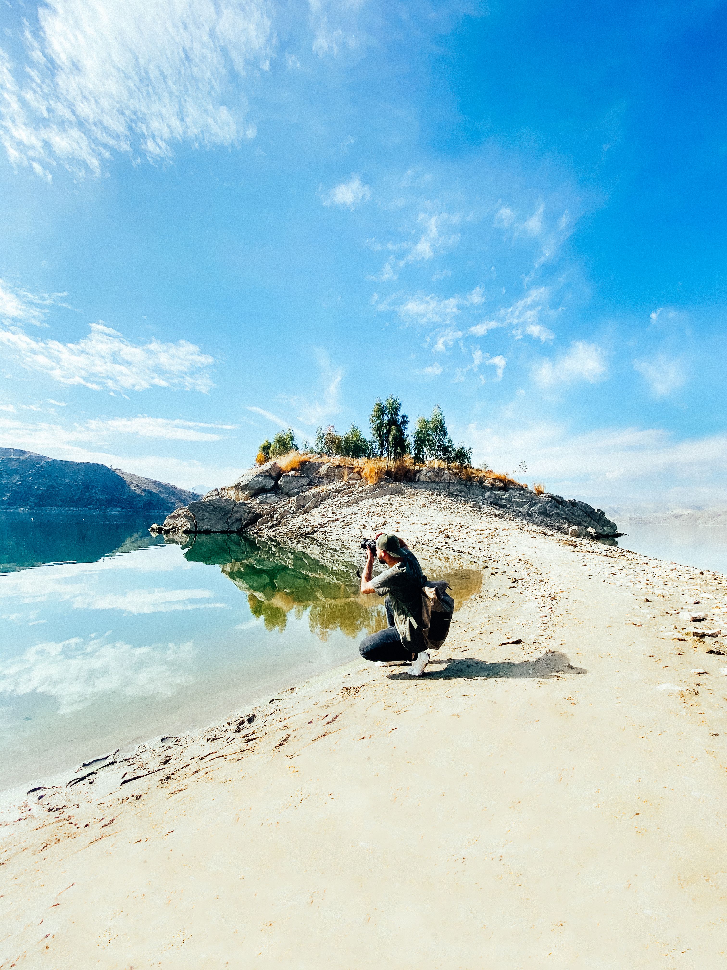Person Talking a Photo of the Calm Ocean · Free Stock Photo