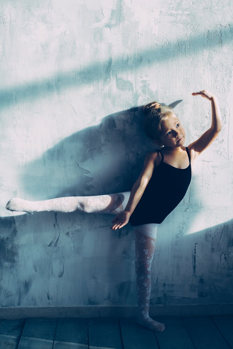 A Blonde Girl Dancing Ballet 