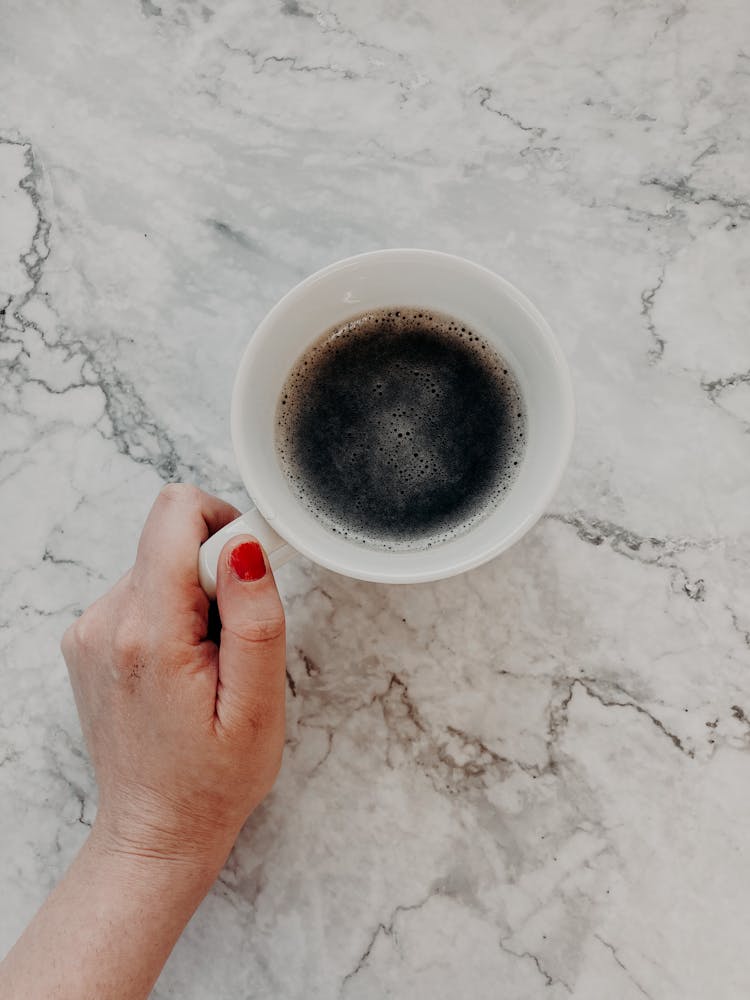 Crop Unrecognizable Woman With Cup Of Black Coffee