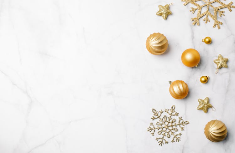 Christmas Decorations Placed On Marble Surface