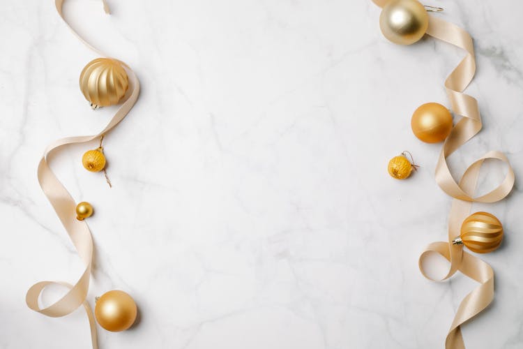 Shiny Christmas Golden Baubles With Silky Ribbons