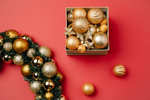 Christmas baubles with wreath and shiny ornaments