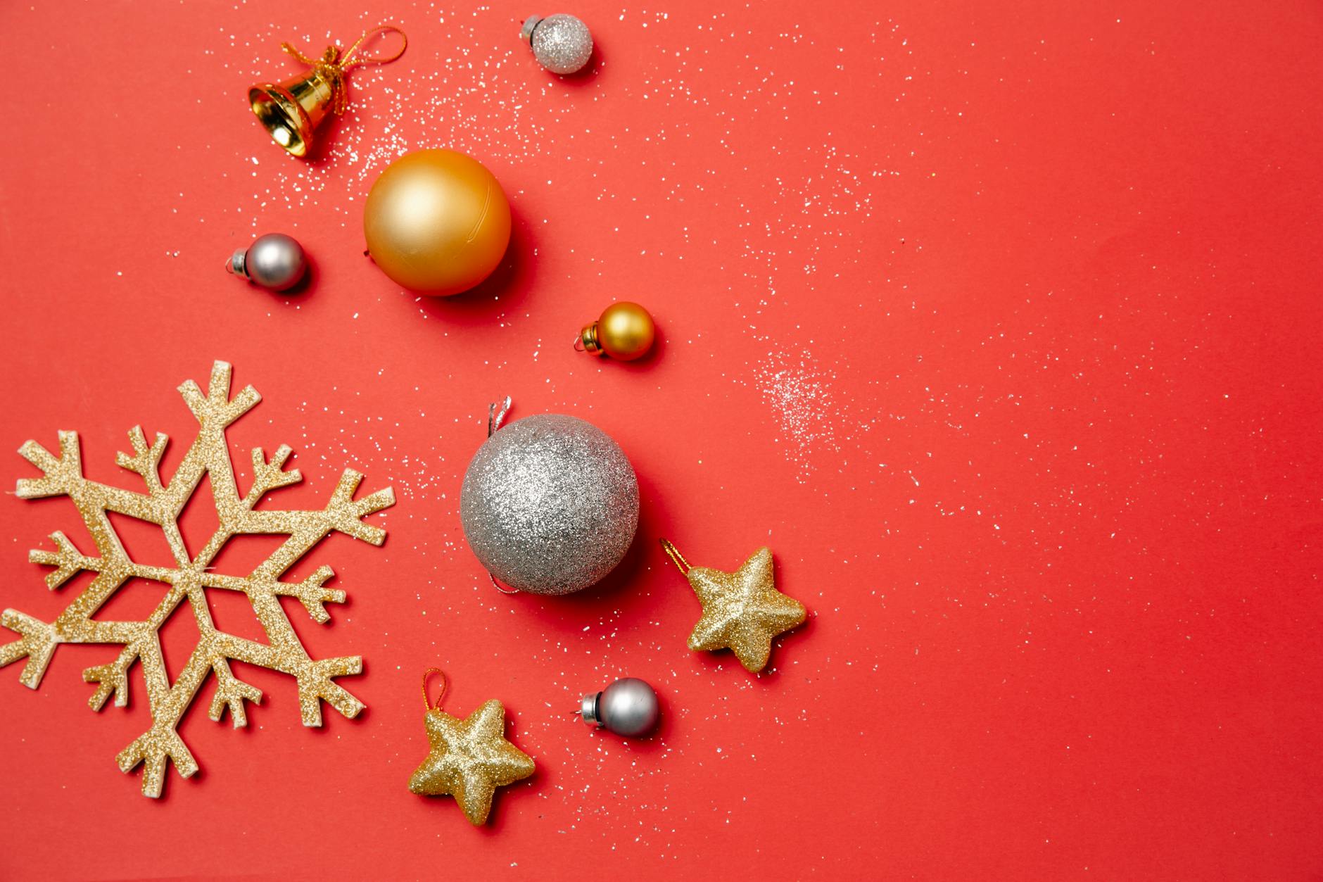 Christmas composition with shiny hanging baubles
