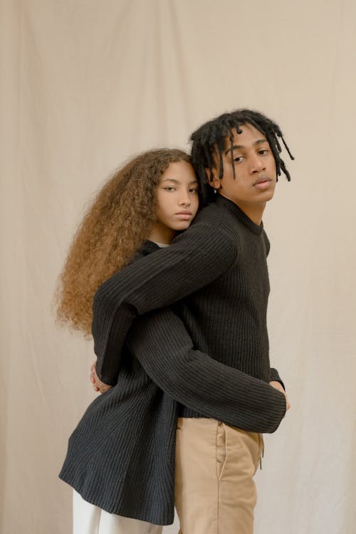 Free Woman Back Hugging a Man While Standing Stock Photo