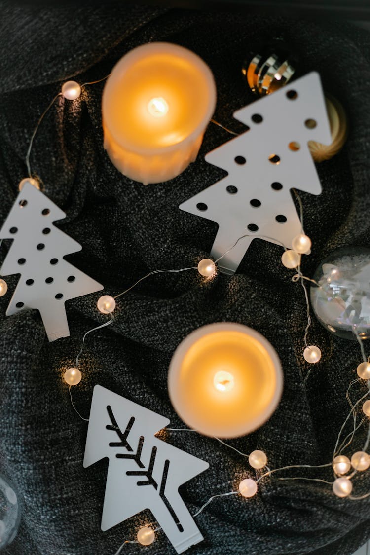 Christmas Decoration And Garland Placed On Fabric