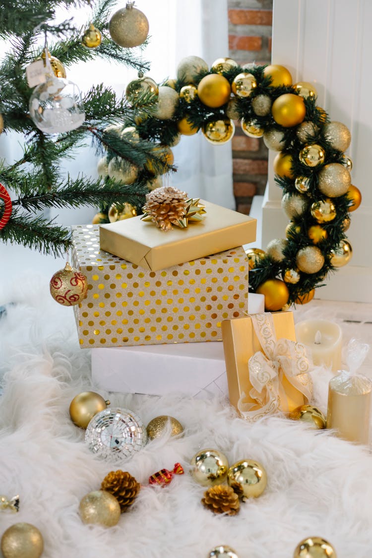 Presents Placed Near Christmas Tree In Apartment